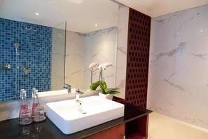 Bathtub, hair dryer, towels, soap