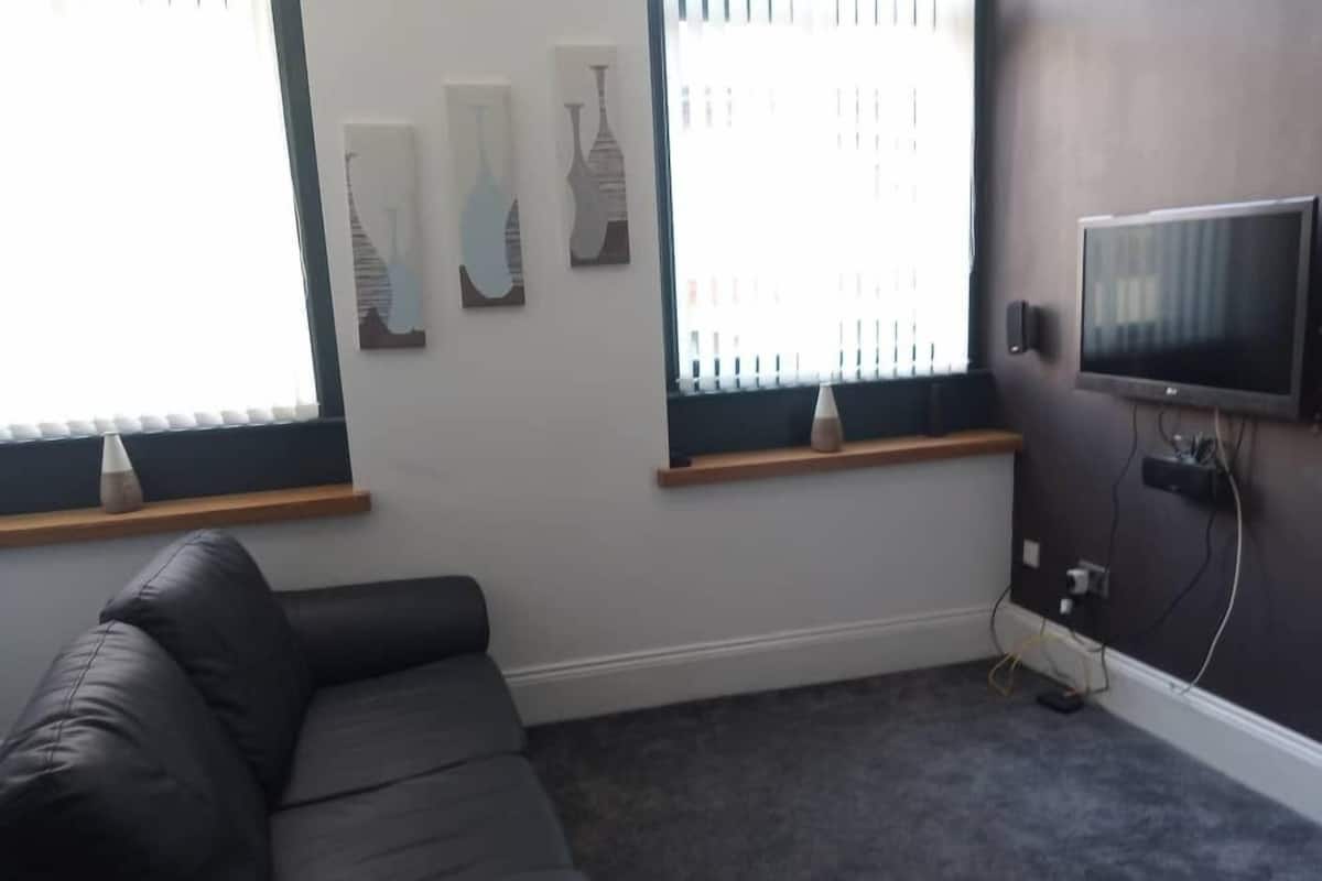 Apartment, 2 Bedrooms | Living area | Flat-screen TV