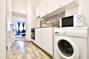 Apartment | Private kitchen | Fridge, microwave, oven, stovetop - Cosy two bedroom flat in Rottenbiller str, Sky (Budapest)