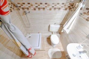 Departamento | Baño | Regadera y toallas