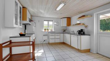 Fridge, stovetop, dishwasher, coffee/tea maker