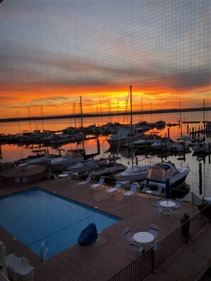 Outdoor pool, a heated pool - Waterfront Setting w/ Top-Floor Views Overlooking Lake Charlevoix (Charlevoix)