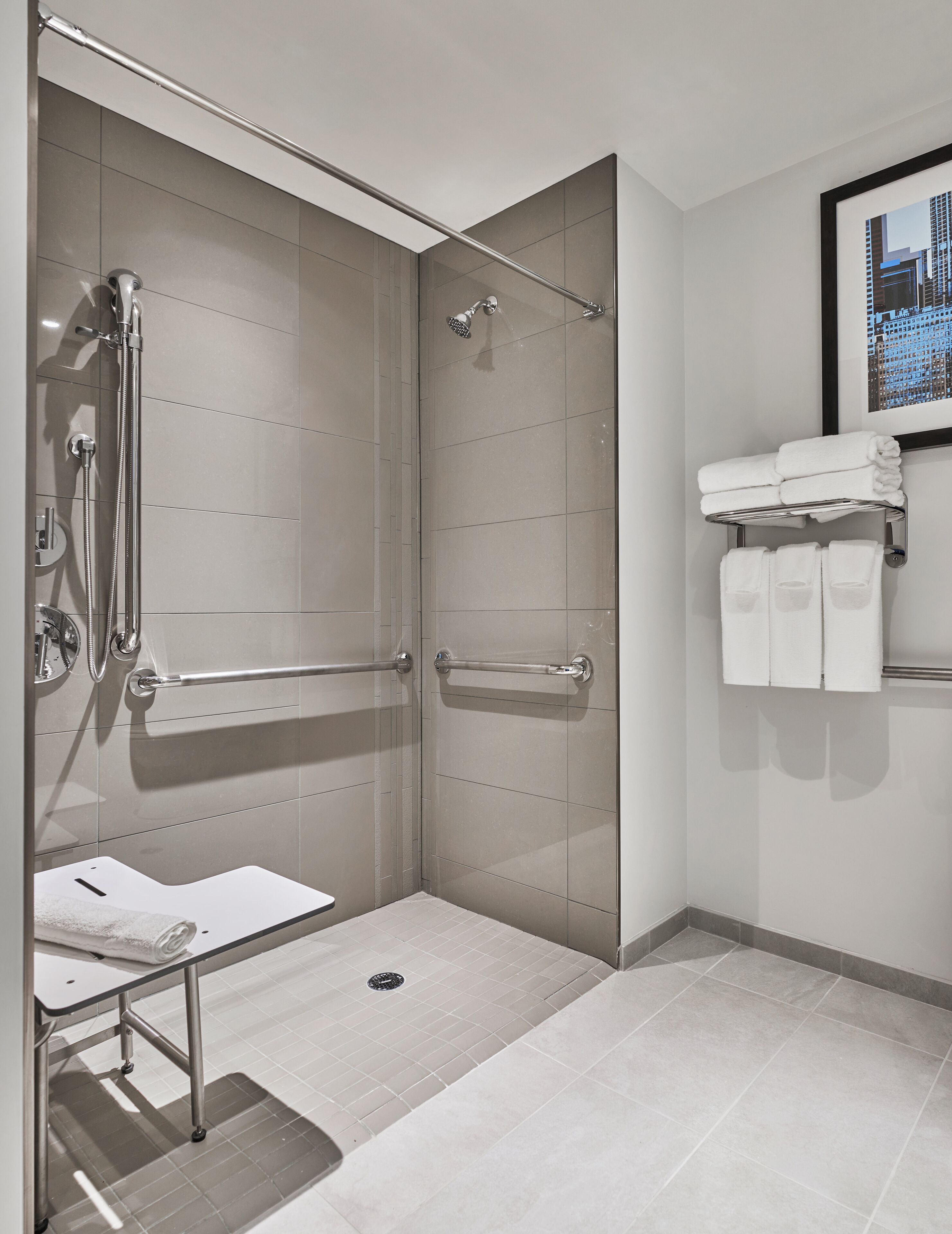 designer toiletries, hair dryer, towels