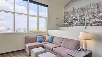 Suite, 1 Bedroom (Specialty) | In-room safe, desk, laptop workspace, blackout drapes