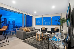 Comfort Apartment | Living area | Flat-screen TV