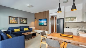 Apartment | Living area | 50-inch flat-screen TV with digital channels, TV