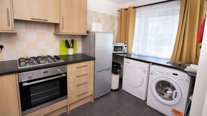 Fridge, oven, dishwasher, cookware/dishes/utensils