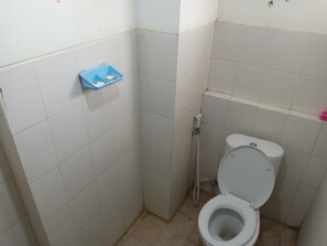 Estudio | Baño | Regadera y toallas