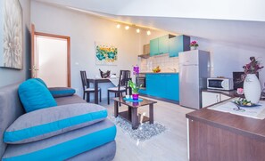 Apartamento (Tomo) | Zona de estar | Una televisión de pantalla plana