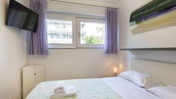 2 habitaciones, tabla de planchar con plancha y wifi gratis