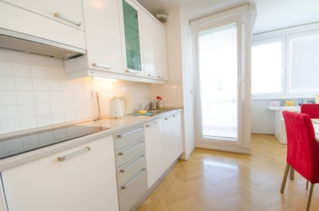 Apartment | Private kitchen | Fridge, stovetop, cookware/dishes/utensils