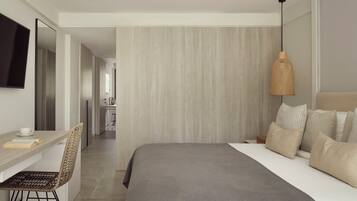 Une chambre d’hôtel moderne équipée d’un lit, d’un bureau, d’une chaise, d’une télévision et d’un luminaire suspendu.