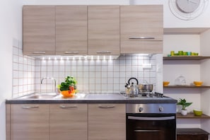 Apartment, 1 Bedroom (A CASA DI ALFONSO) | Private kitchen | Full-size fridge, stovetop, dishwasher, espresso maker