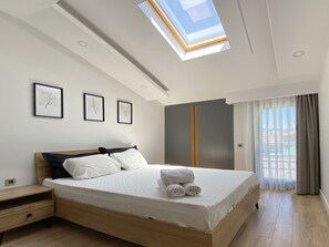 Dúplex familiar, 2 habitaciones | Ropa de cama de alta calidad y caja de seguridad en la habitación