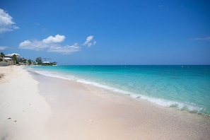 On the beach, sun-loungers, beach towels