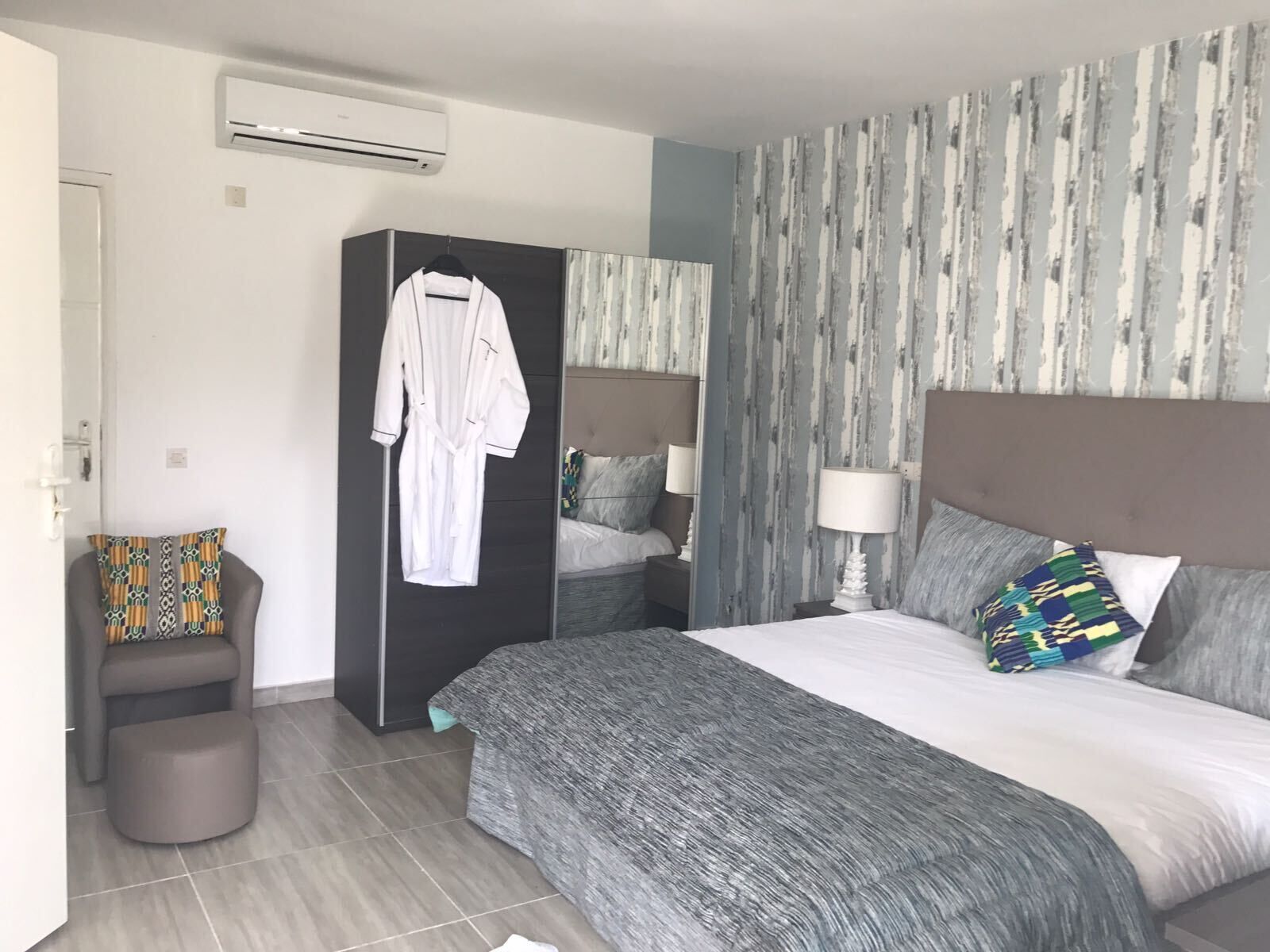 Comfort Room | Individually decorated, desk, laptop workspace, iron/ironing board