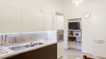 Appartamento, 2 camere da letto | Cucina privata | Frigorifero con congelatore, microonde, forno, piano cottura