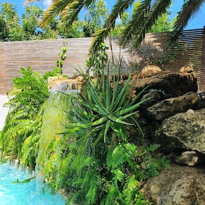Outdoor pool, open 9:00 AM to 10:00 PM, pool umbrellas, pool loungers