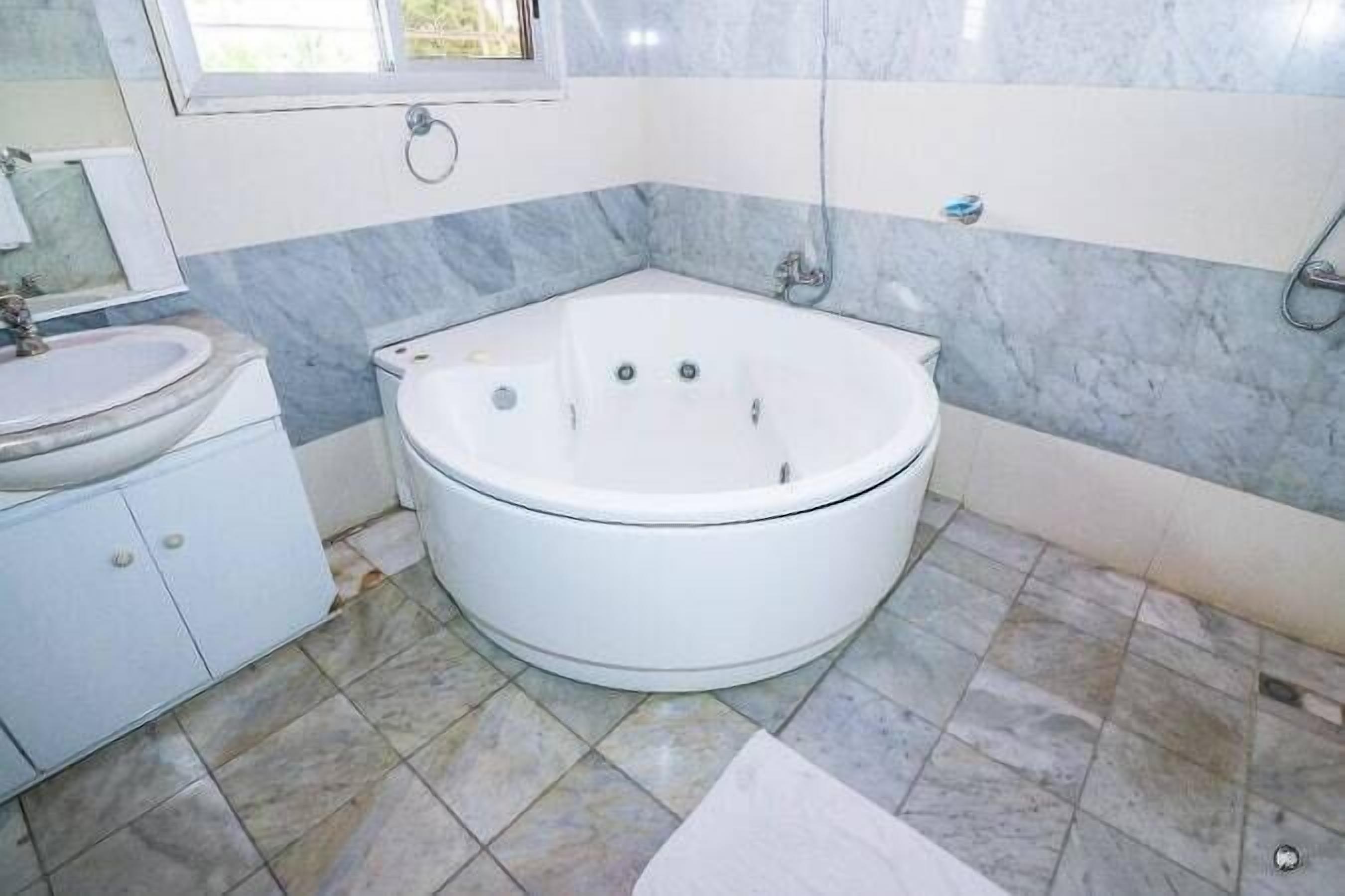 Luxury Villa | Bathroom | Shower, towels, soap, toilet paper