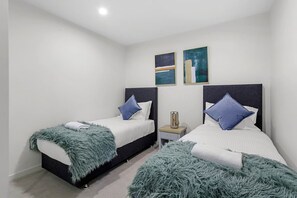 2 bedrooms, desk, iron/ironing board, travel crib