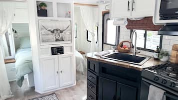 Microwave, coffee/tea maker, cookware/dishes/utensils