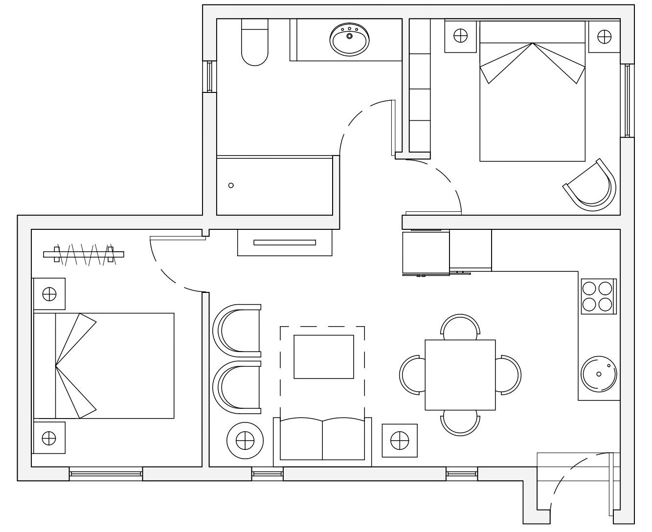 A floor plan of a hotel room with a bed, a desk, a chair, a small table, and a bathroom.