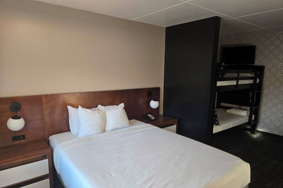 Hypo-allergenic bedding available, in-room safe, laptop workspace