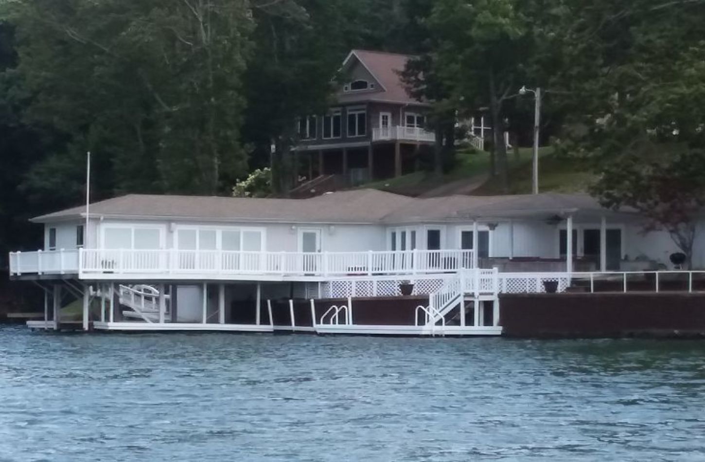Wilson Lake House. Boatlift underneath living room.
