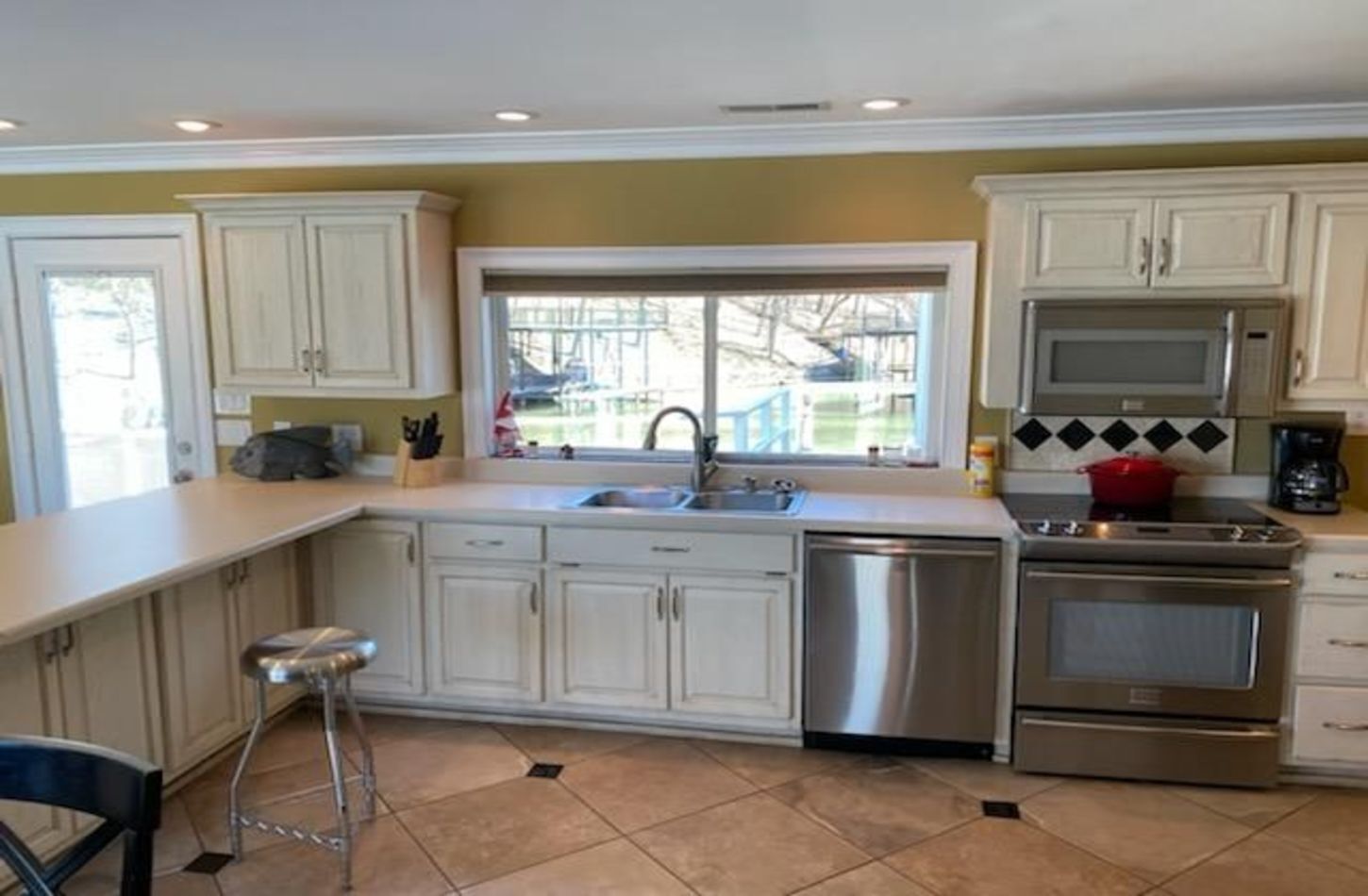 Wilson Lake House. Boatlift underneath living room.