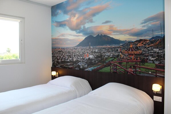 Desk, laptop workspace, blackout curtains, free WiFi