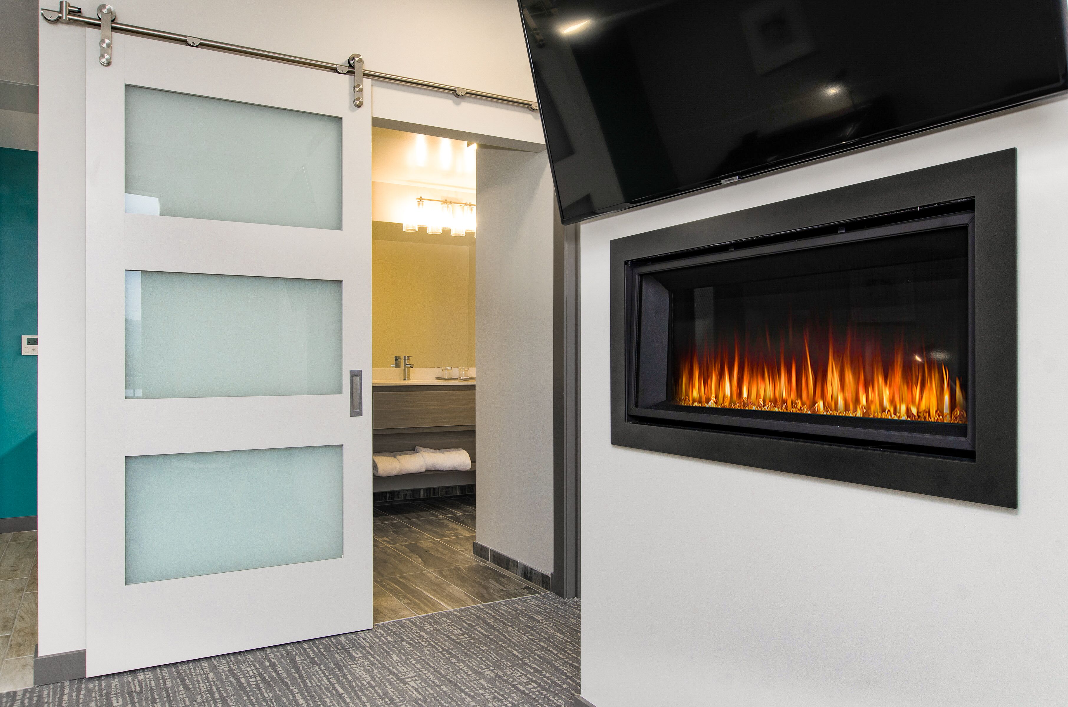 premium bedding, memory-foam beds, desk, laptop workspace