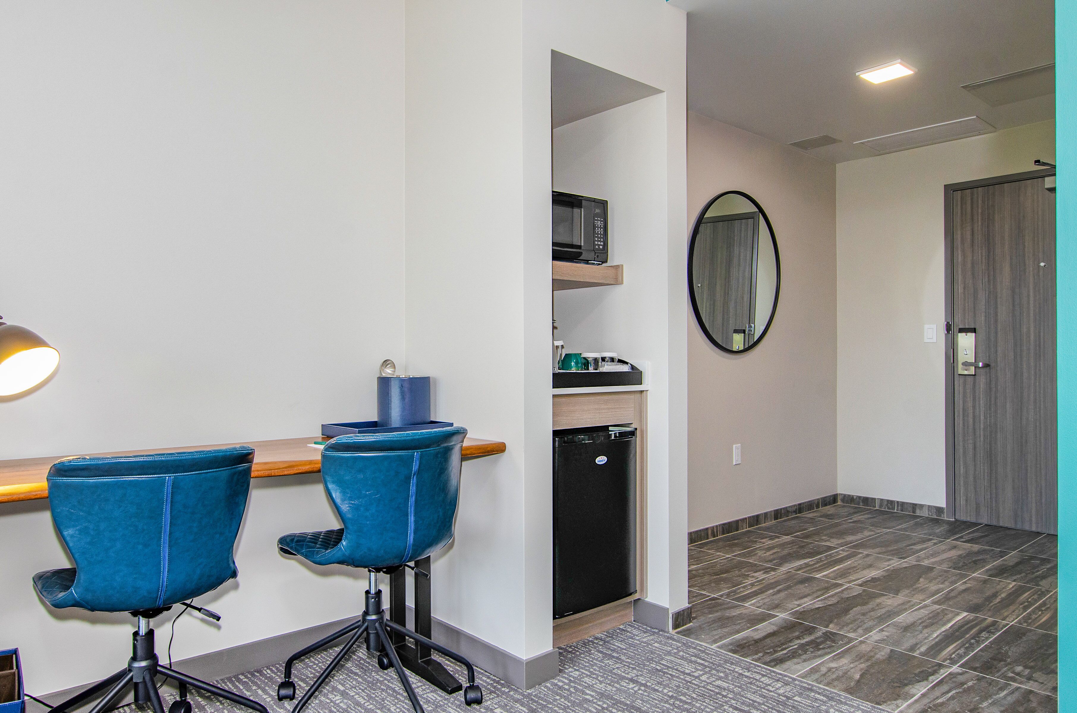 premium bedding, memory-foam beds, desk, laptop workspace