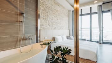 Family Room, 2 Bedrooms | Bathroom | Hair dryer, slippers, towels, shampoo