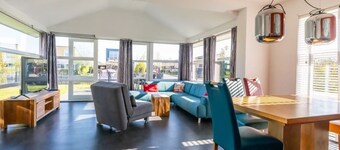 Spacious, modern island house located on a corner with fully enclosed garden, ideal for children.