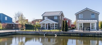 Spacious, modern island house located on a corner with fully enclosed garden, ideal for children.