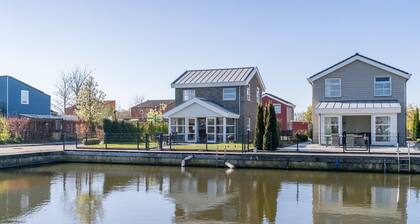 Maison insulaire spacieuse et moderne située sur un coin avec jardin entiÚrement clos, idéale pour l