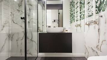 Classic Apartment | Bathroom | Shower, hair dryer, towels, soap