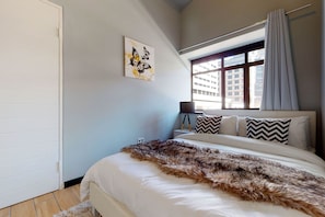 2 bedrooms, premium bedding, blackout curtains, iron/ironing board