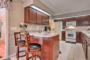 Fridge, microwave, stovetop, dishwasher - Centrally Located Deltona Home with Pool & Yard (Deltona)