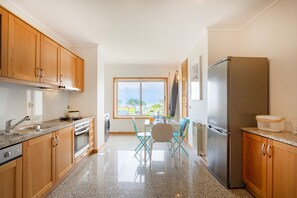 Apartment, 2 Bedrooms, Ocean View | Private kitchen | Full-size fridge, microwave, oven, stovetop