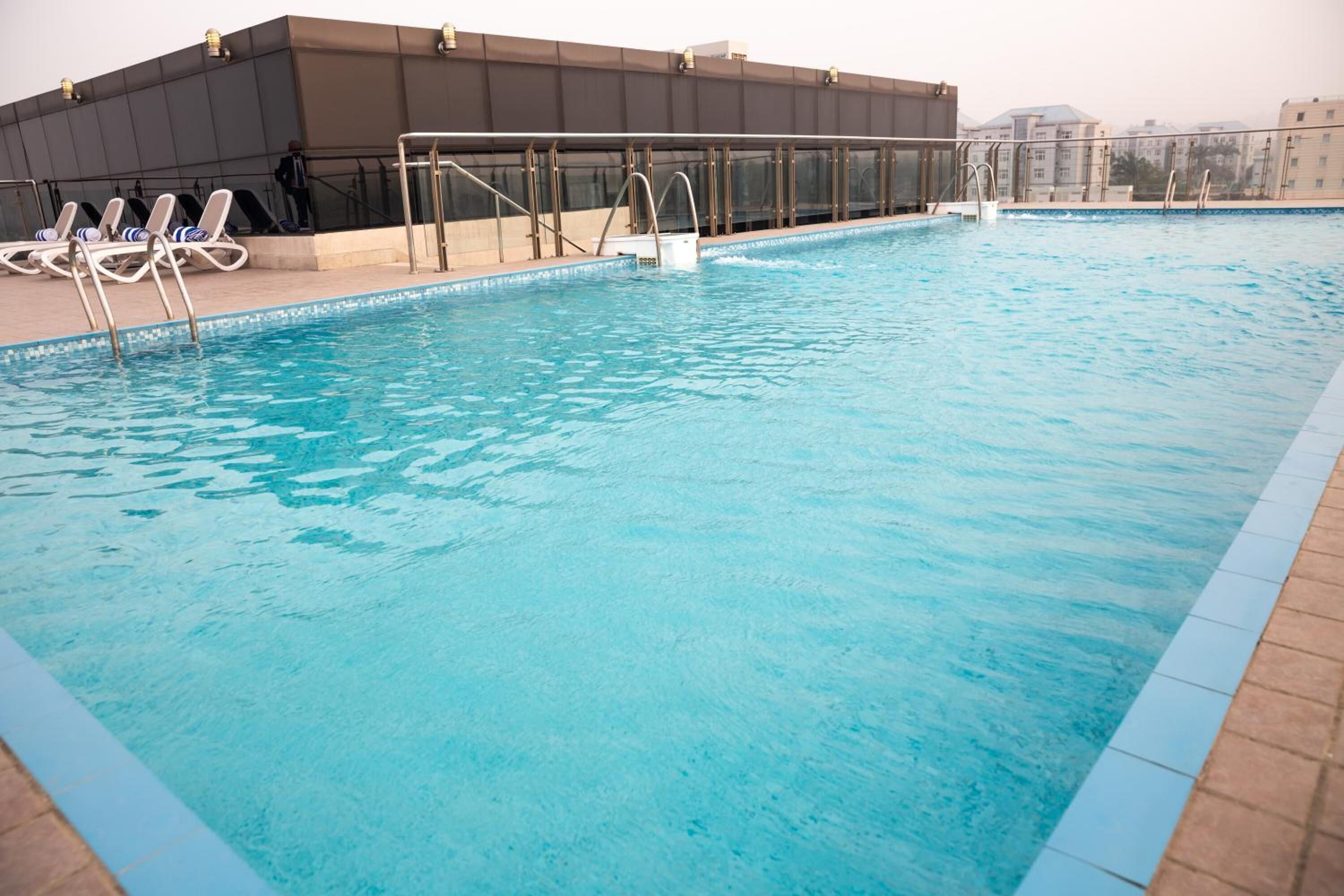 2 outdoor pools, pool umbrellas, pool loungers