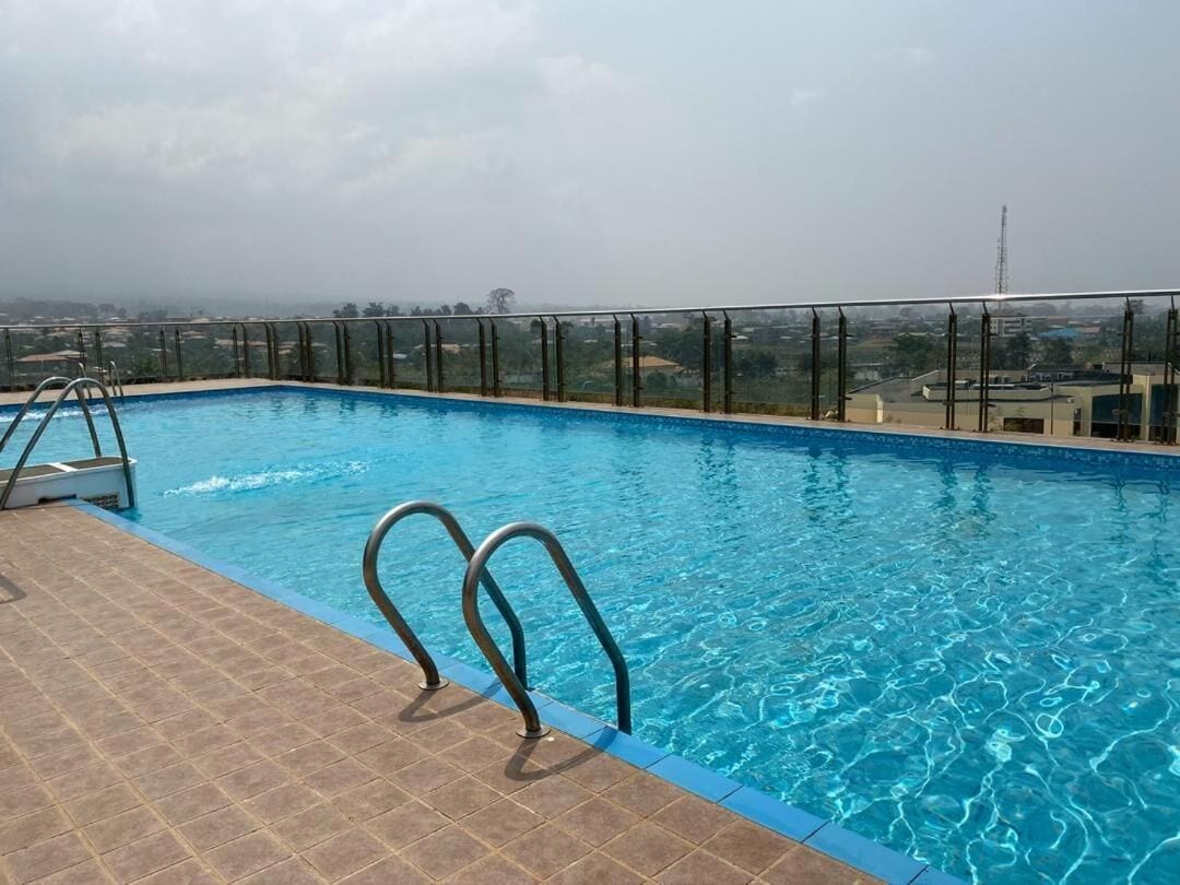 2 outdoor pools, pool umbrellas, pool loungers