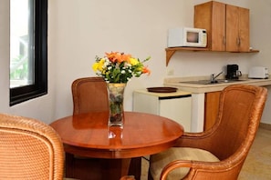 Mini-fridge, microwave, stovetop, coffee/tea maker