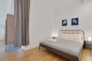2 bedrooms, premium bedding, iron/ironing board, WiFi