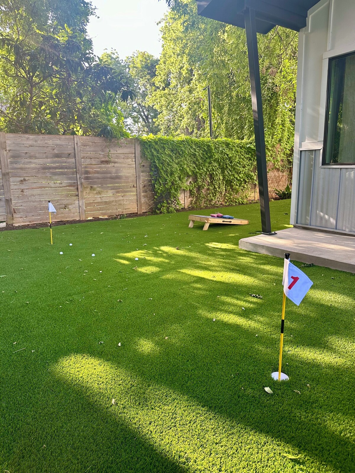 Photo 8 of Downtown 6 Bedroom Retreat!!
Golf Putting Green, Walking to Lake & Rainey