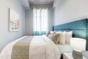 2 bedrooms, blackout curtains, iron/ironing board, free WiFi