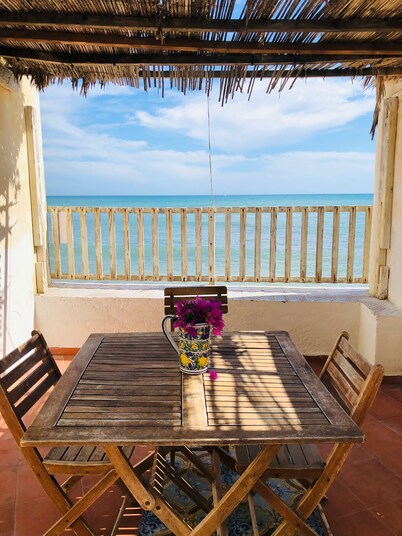 Blue House: terrace and veranda overlooking the sea from the garden. Beach access from home