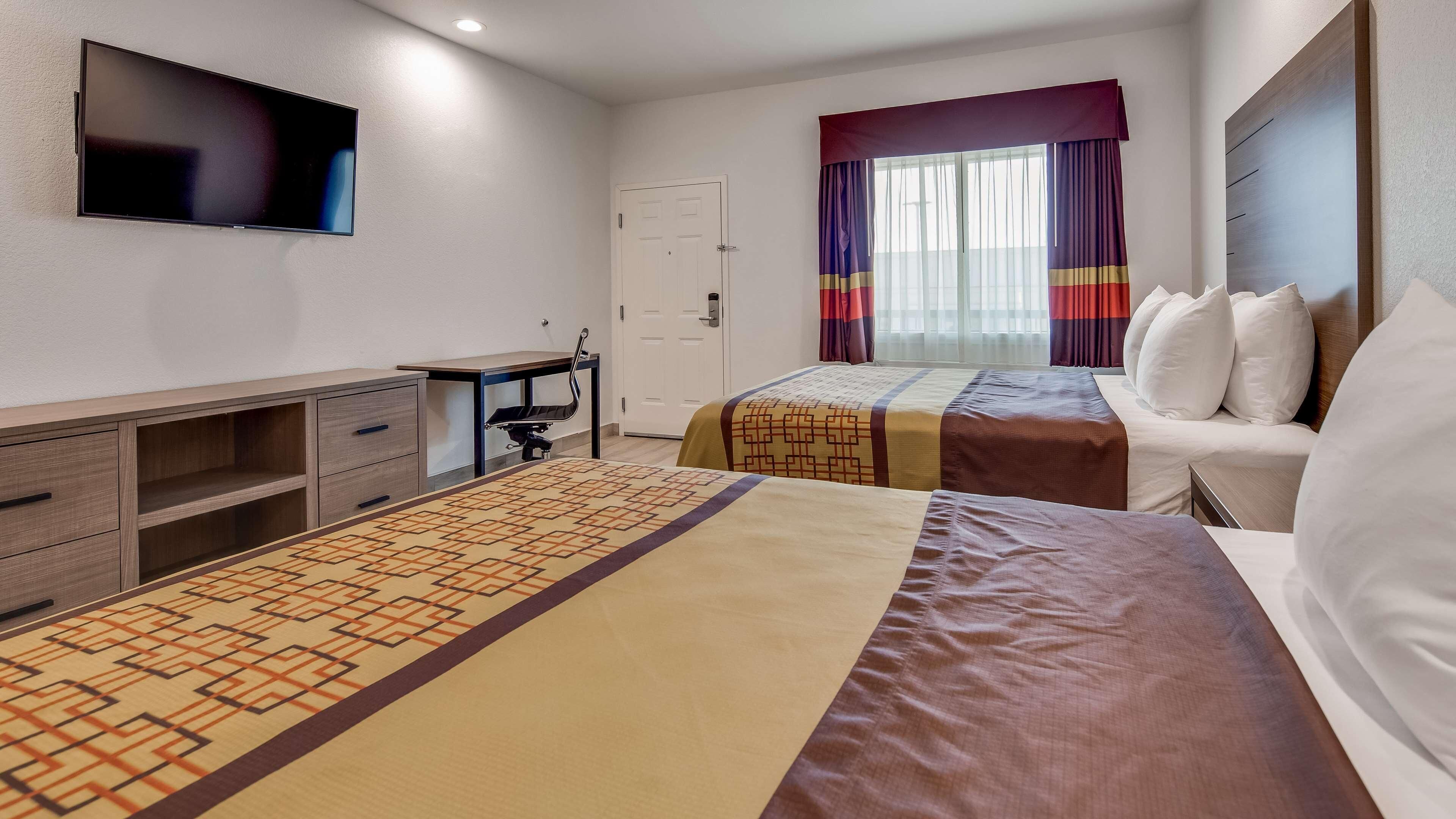 Desk, laptop workspace, free WiFi, bed sheets