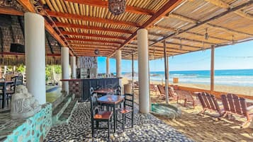 Breakfast, lunch served; local and international cuisine, beach views