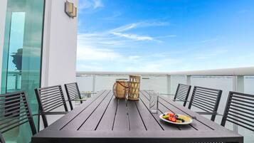 Adjacent Six Bed Four Bath Apartment | Balcony